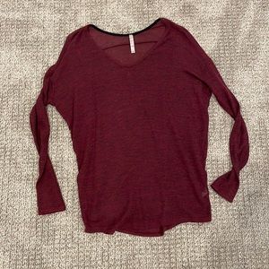 Maroon long sleeve. Perfect for layering or pairing with leggings.